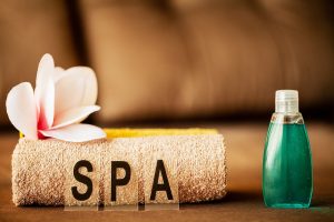Chocolate Spa. Composition brown towel in hotel room of spa treatment